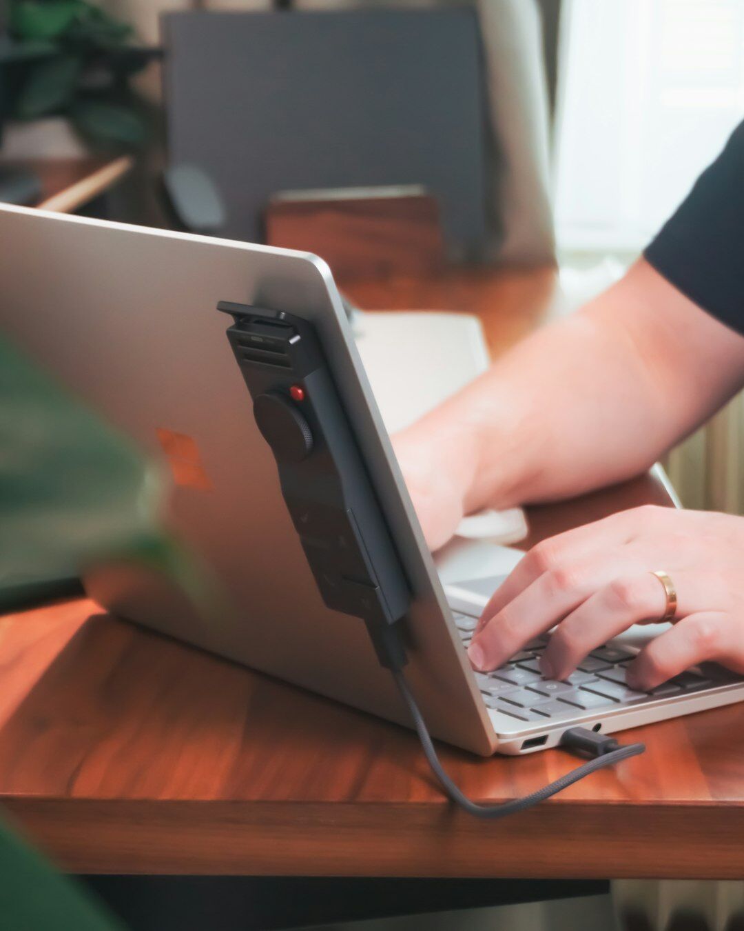 Person reading legal information on a laptop at a desk